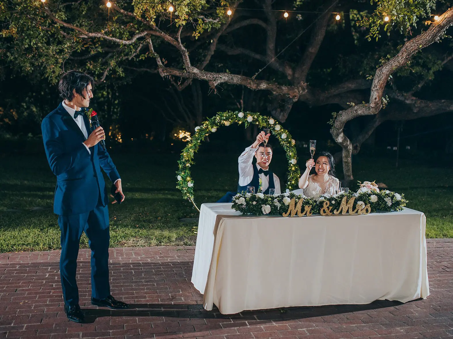 low light wedding reception outdoors